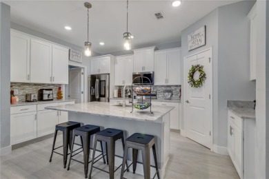 FULL GOLF & TENNIS MEMBERSHP INCLUDED.  Step into luxury living on The Oasis Club at Champions Gate in Florida - for sale on GolfHomes.com, golf home, golf lot