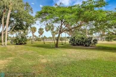 Resort style living in the Grove at Palm Aire!  This well-lit on  in Florida - for sale on GolfHomes.com, golf home, golf lot