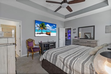 FULL GOLF & TENNIS MEMBERSHP INCLUDED.  Step into luxury living on The Oasis Club at Champions Gate in Florida - for sale on GolfHomes.com, golf home, golf lot