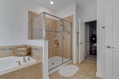 FULL GOLF & TENNIS MEMBERSHP INCLUDED.  Step into luxury living on The Oasis Club at Champions Gate in Florida - for sale on GolfHomes.com, golf home, golf lot