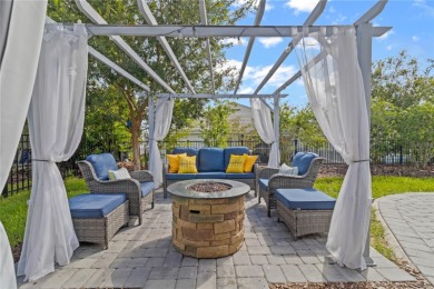 FULL GOLF & TENNIS MEMBERSHP INCLUDED.  Step into luxury living on The Oasis Club at Champions Gate in Florida - for sale on GolfHomes.com, golf home, golf lot