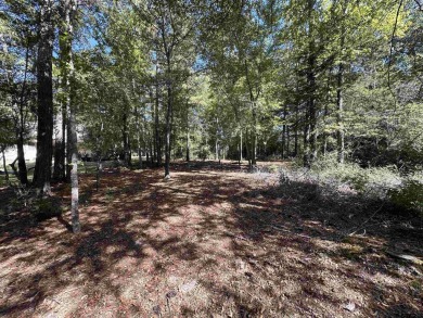 Build your custom home on this beautiful tree shaded lot on Holly Lake Ranch Golf Club in Texas - for sale on GolfHomes.com, golf home, golf lot