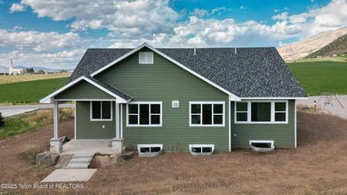 Stunning new construction home overlooking Valli Vu Golf Course on Valli Vu Golf Course in Wyoming - for sale on GolfHomes.com, golf home, golf lot