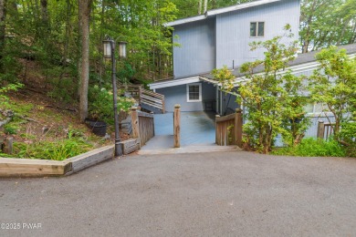 Privately set Lakefront Retreat with three levels of abundant on Lords Valley Country Club, Inc in Pennsylvania - for sale on GolfHomes.com, golf home, golf lot
