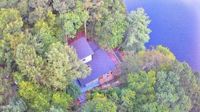 Privately set Lakefront Retreat with three levels of abundant on Lords Valley Country Club, Inc in Pennsylvania - for sale on GolfHomes.com, golf home, golf lot