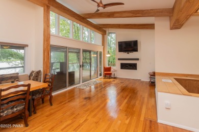 Privately set Lakefront Retreat with three levels of abundant on Lords Valley Country Club, Inc in Pennsylvania - for sale on GolfHomes.com, golf home, golf lot