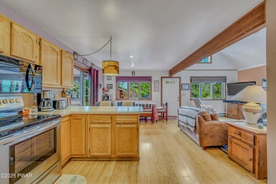 Chalet-Style Retreat in The Hideout This 4-Bedroom, 3-Bath on The Hideout Golf in Pennsylvania - for sale on GolfHomes.com, golf home, golf lot