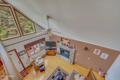 Chalet-Style Retreat in The Hideout This 4-Bedroom, 3-Bath on The Hideout Golf in Pennsylvania - for sale on GolfHomes.com, golf home, golf lot