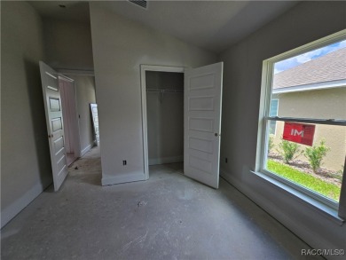 FANTASTIC 3 BEDROOM / 2 BATH GREAT ROOM PLAN WITH HUGE FAMILY on Twisted Oaks Golf Club in Florida - for sale on GolfHomes.com, golf home, golf lot