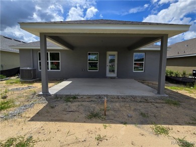 FANTASTIC 3 BEDROOM / 2 BATH GREAT ROOM PLAN WITH HUGE FAMILY on Twisted Oaks Golf Club in Florida - for sale on GolfHomes.com, golf home, golf lot