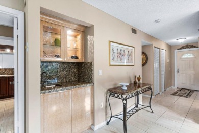 Turn-key first-floor corner condo in Stratford East at Hunters on Hunters Run Golf and Country Club in Florida - for sale on GolfHomes.com, golf home, golf lot