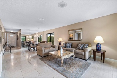 Turn-key first-floor corner condo in Stratford East at Hunters on Hunters Run Golf and Country Club in Florida - for sale on GolfHomes.com, golf home, golf lot