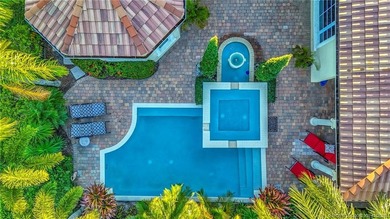 Welcome to this stunning Tuscan-inspired estate featuring an on The Tesoro Golf Course and Club in Florida - for sale on GolfHomes.com, golf home, golf lot