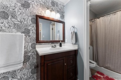 This beautifully updated contemporary ranch in the heart of on Brandermill Country Club in Virginia - for sale on GolfHomes.com, golf home, golf lot
