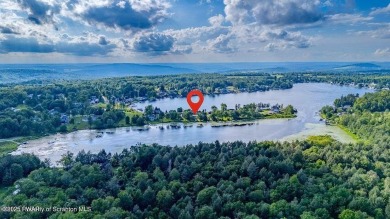 Life at the lake is a little different. Henry David Thoreau once on Elkview Country Club in Pennsylvania - for sale on GolfHomes.com, golf home, golf lot