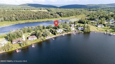Life at the lake is a little different. Henry David Thoreau once on Elkview Country Club in Pennsylvania - for sale on GolfHomes.com, golf home, golf lot