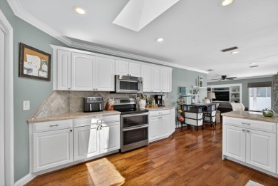 Charming 4-Bed, 3.5 Bath Lakefront Home in Palm Beach Gardens! on BallenIsles Golf and Country Club in Florida - for sale on GolfHomes.com, golf home, golf lot