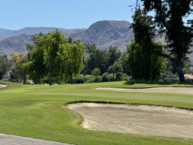 Views! Set against one of the most breathtaking backdrops in the on Mission Hills Golf Club in California - for sale on GolfHomes.com, golf home, golf lot