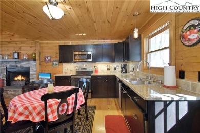 This is the cabin in the woods where you can envision your on Beech Mountain Club in North Carolina - for sale on GolfHomes.com, golf home, golf lot