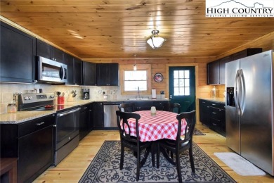 This is the cabin in the woods where you can envision your on Beech Mountain Club in North Carolina - for sale on GolfHomes.com, golf home, golf lot