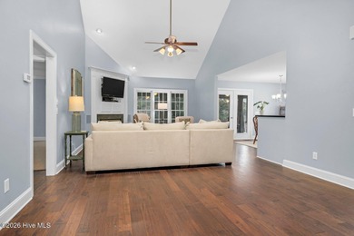 Set along the 13th green in The River subdivision of Lake Royale on River Golf and Country Club at Lake Royale in North Carolina - for sale on GolfHomes.com, golf home, golf lot