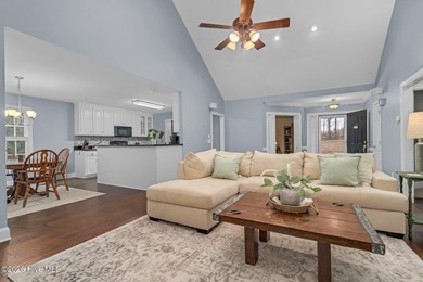 Set along the 13th green in The River subdivision of Lake Royale on River Golf and Country Club at Lake Royale in North Carolina - for sale on GolfHomes.com, golf home, golf lot