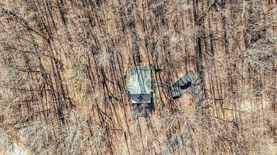 This updated 4-bedroom, 3-bath home is tucked into the Bent Tree on Bent Tree Golf Course in Georgia - for sale on GolfHomes.com, golf home, golf lot