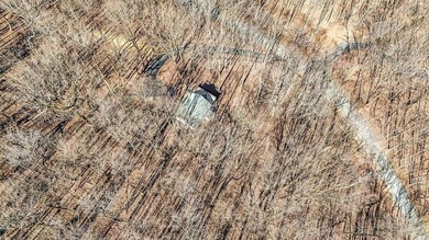 This updated 4-bedroom, 3-bath home is tucked into the Bent Tree on Bent Tree Golf Course in Georgia - for sale on GolfHomes.com, golf home, golf lot