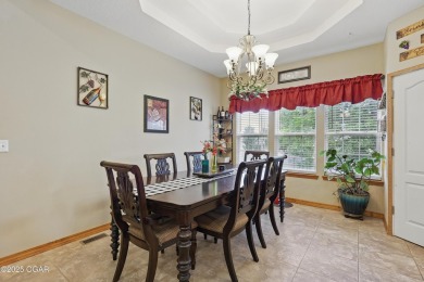 Welcome to 702 Copper Oaks Drive, a stunning 4-bedroom, 3-bath on Briarbrook Golf Course in Missouri - for sale on GolfHomes.com, golf home, golf lot