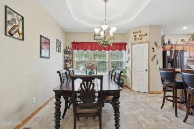 Welcome to 702 Copper Oaks Drive, a stunning 4-bedroom, 3-bath on Briarbrook Golf Course in Missouri - for sale on GolfHomes.com, golf home, golf lot