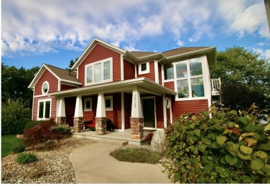 Welcome to ''The Red House'' situated on Grandview Isle, an on Island Hills Golf Club in Michigan - for sale on GolfHomes.com, golf home, golf lot