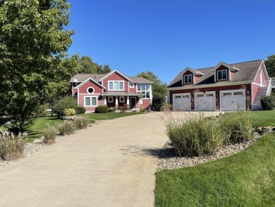 Welcome to ''The Red House'' situated on Grandview Isle, an on Island Hills Golf Club in Michigan - for sale on GolfHomes.com, golf home, golf lot