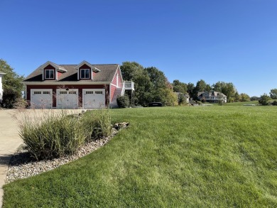 Welcome to ''The Red House'' situated on Grandview Isle, an on Island Hills Golf Club in Michigan - for sale on GolfHomes.com, golf home, golf lot