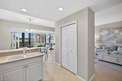 Relax and enjoy STUNNING LAKE AND GOLF COURSE VIEWS from this on Shadow Wood Country Club in Florida - for sale on GolfHomes.com, golf home, golf lot