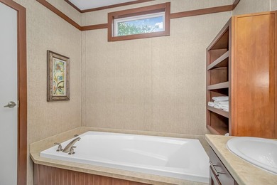 This very open and spacious 3 Bedroom, 2 Bath beach house is on Prestwick Country Club in South Carolina - for sale on GolfHomes.com, golf home, golf lot