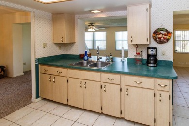 BETTER BE QUICK TO THIS ABSOLUTELY TURN KEY HOME IN THE ACTIVE on Mainlands Golf Club in Florida - for sale on GolfHomes.com, golf home, golf lot