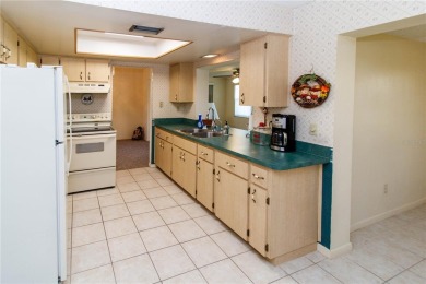 BETTER BE QUICK TO THIS ABSOLUTELY TURN KEY HOME IN THE ACTIVE on Mainlands Golf Club in Florida - for sale on GolfHomes.com, golf home, golf lot