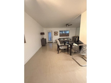 Enjoy tranquil lakeview living in this beautifully updated on Kings Point Golf - Executive in Florida - for sale on GolfHomes.com, golf home, golf lot