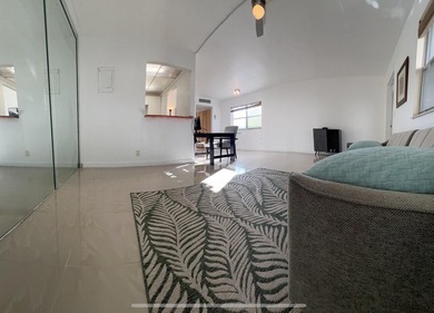 Enjoy tranquil lakeview living in this beautifully updated on Kings Point Golf - Executive in Florida - for sale on GolfHomes.com, golf home, golf lot