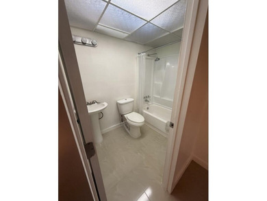 Enjoy tranquil lakeview living in this beautifully updated on Kings Point Golf - Executive in Florida - for sale on GolfHomes.com, golf home, golf lot