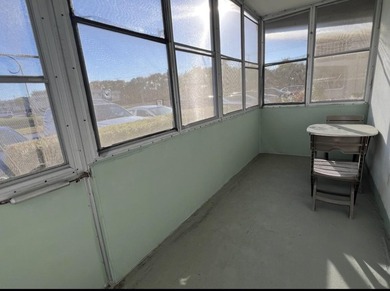 Enjoy tranquil lakeview living in this beautifully updated on Kings Point Golf - Executive in Florida - for sale on GolfHomes.com, golf home, golf lot