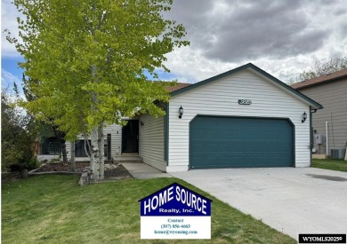 This thoughtfully designed home boasts three generously sized on Riverton Country Club in Wyoming - for sale on GolfHomes.com, golf home, golf lot