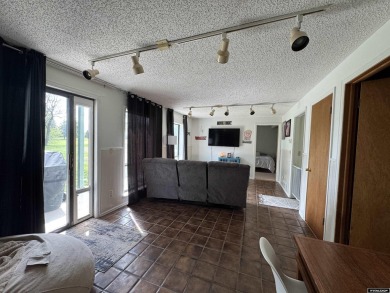 This thoughtfully designed home boasts three generously sized on Riverton Country Club in Wyoming - for sale on GolfHomes.com, golf home, golf lot