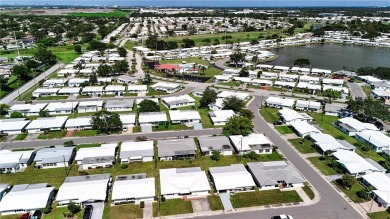 BETTER BE QUICK TO THIS ABSOLUTELY TURN KEY HOME IN THE ACTIVE on Mainlands Golf Club in Florida - for sale on GolfHomes.com, golf home, golf lot