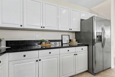 An elegant single-story Mediterranean-style pool home on TPC Eagle Trace in Florida - for sale on GolfHomes.com, golf home, golf lot