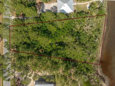 Enjoy views of the Gulf on this waterfront, 1-acre parcel with on St. James Bay in Florida - for sale on GolfHomes.com, golf home, golf lot