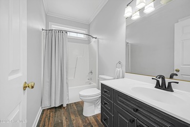 Welcome to this spacious and beautifully maintained 4-bedroom on Magnolia Greens Golf Plantation in North Carolina - for sale on GolfHomes.com, golf home, golf lot