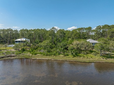 Enjoy views of the Gulf on this waterfront, 1-acre parcel with on St. James Bay in Florida - for sale on GolfHomes.com, golf home, golf lot