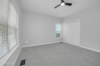 Welcome to this spacious and beautifully maintained 4-bedroom on Magnolia Greens Golf Plantation in North Carolina - for sale on GolfHomes.com, golf home, golf lot