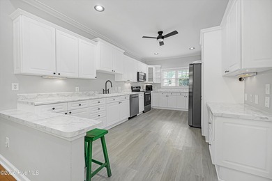 Welcome to this spacious and beautifully maintained 4-bedroom on Magnolia Greens Golf Plantation in North Carolina - for sale on GolfHomes.com, golf home, golf lot